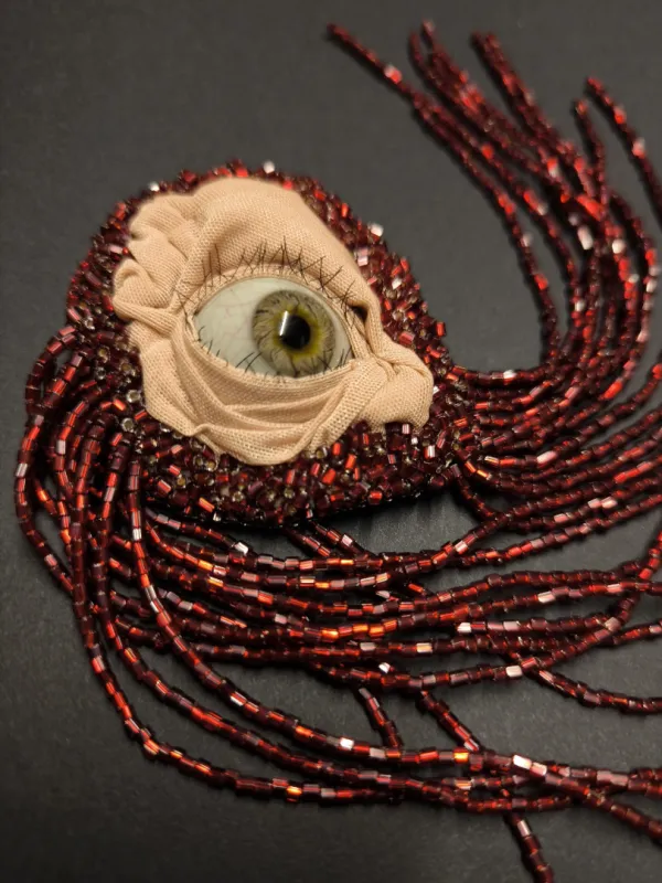 Produit Œil Écarlate Image